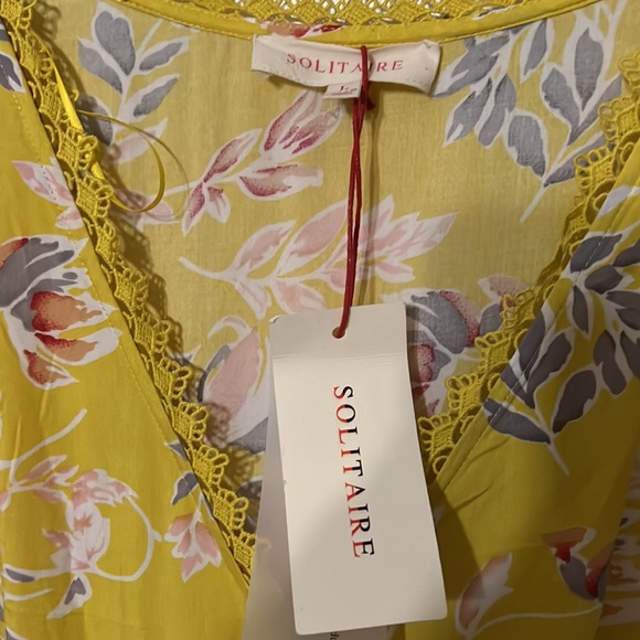 Unique summer dress, pretty detail. Imported lace, wrap with detailed ruffle. - Picture 2 of 6